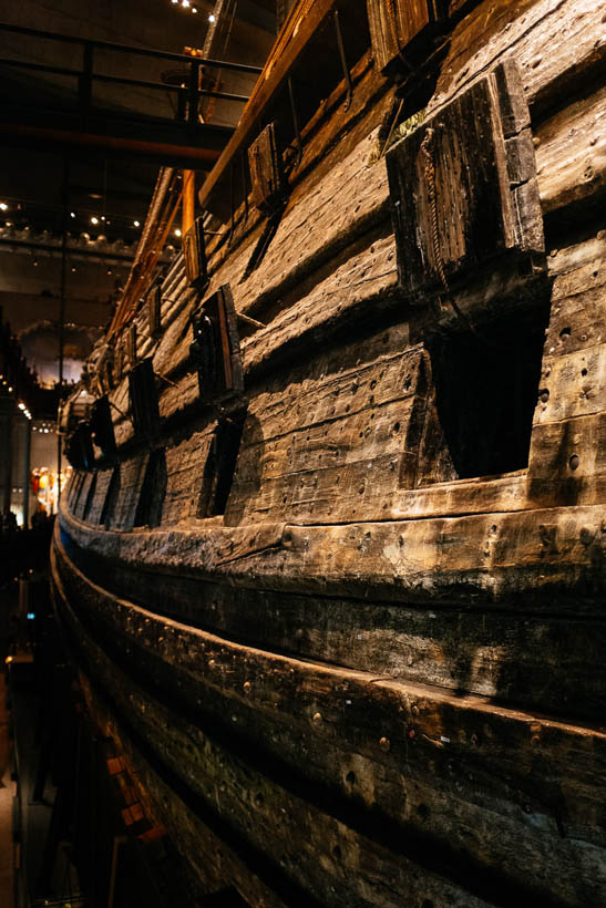 A weathered gun port of the Vasa Boat in the Vasa Museum in Stockholm.
