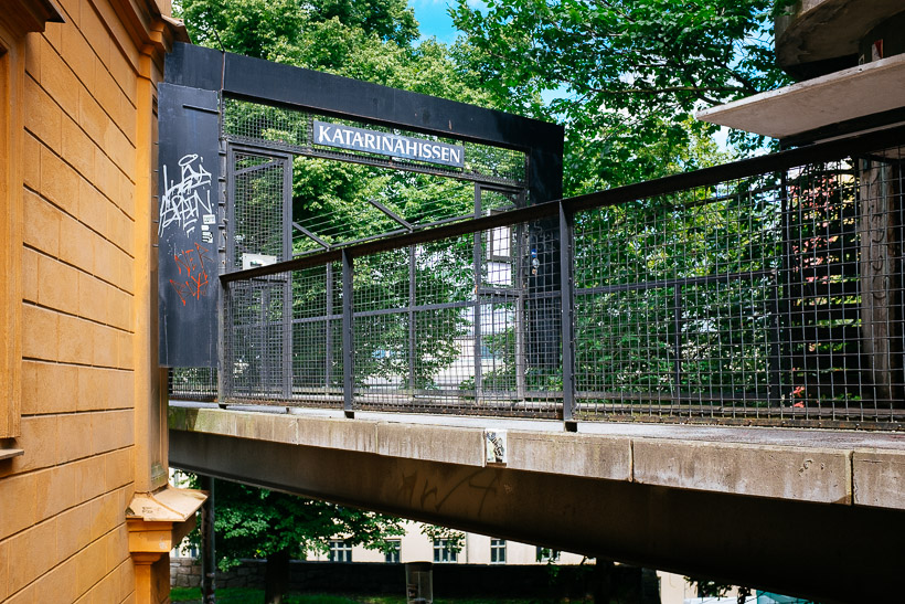 The bridge and gate leading to the Katarinahissen lift in Stockholm, covered in graffiti.