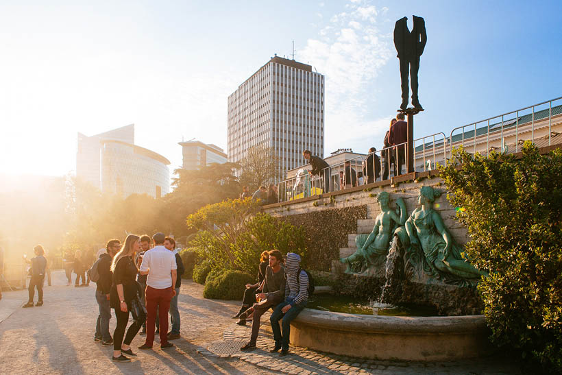 People waiting at a pond at the Botanique in Brussels during Les Nuits Botanique.