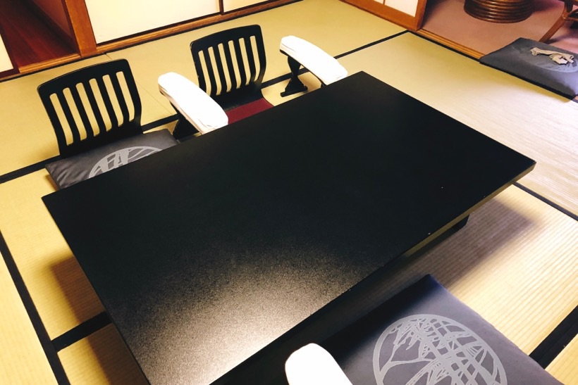 A short table (chabudai) used as a dining table for a kaiseki dinner in a ryokan in Kyoto, Japan.