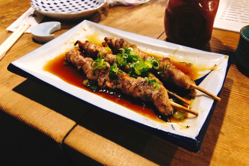 Yakitori - chicken on a skewer - in a small izakaya in the center of Kyoto, Japan.