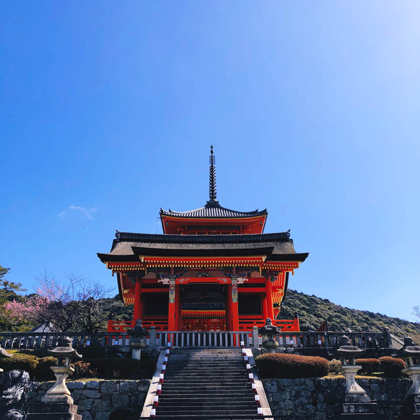 A red temple at the Kiyomizudera temple complex in Kyoto, Japan.