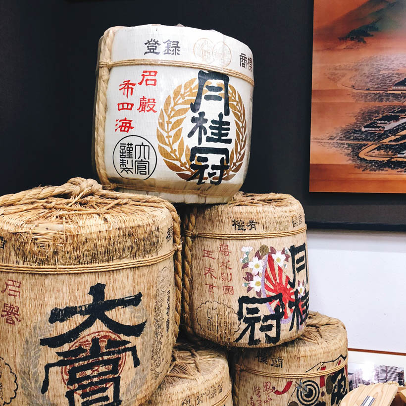 Sake barrels at the Gekkeikan Okura Sake Museum in Kyoto, Japan to illustrate the logistics of delivering sake barrels to customers.