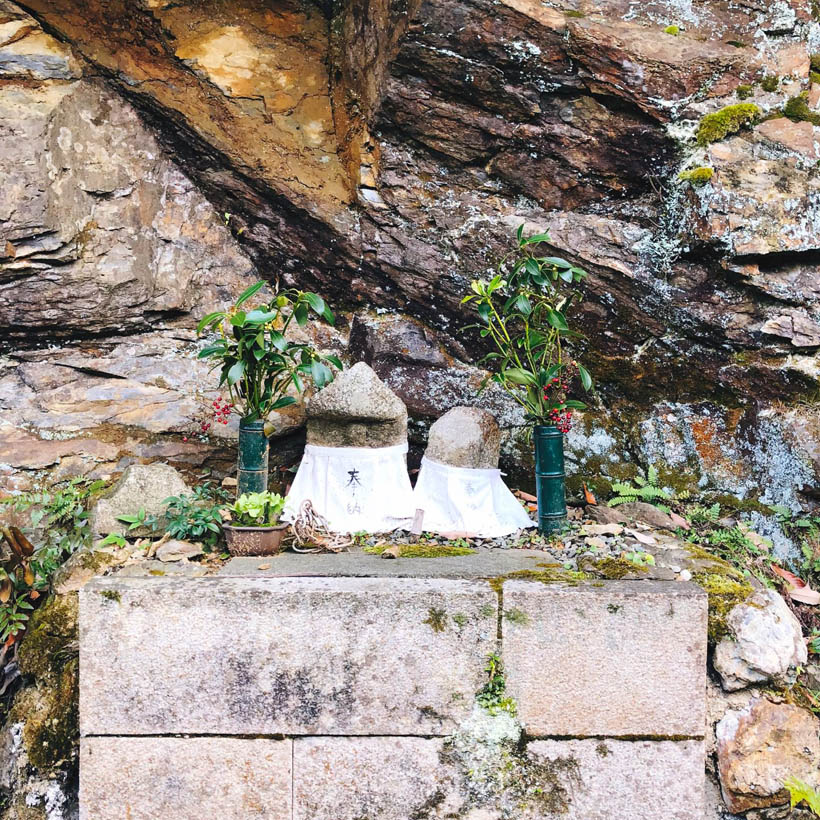 A small offering shrine at Adashino Nenbutsu-ju temple in Kyoto, Japan.