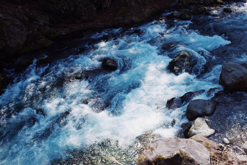 A river running underneath the Shinkyo Bridge in Nikko, Japan.